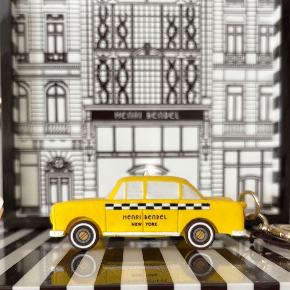 Henri Bendel Yellow Taxi Keychain- does not shine light.